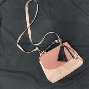 Pink faux leather velvet satchel bag.